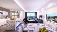 Di sisi lain penthouse, juga ada dapur, ruang makan, dan area duduk yang mengusung konsep open space. Nuansa dapur lebih abu-abu dan dilengkapi meja island marmer. Area meja makan pun tampak simple dan minimalis. Sementara area duduk cenderung menggunakan furniture gelap.