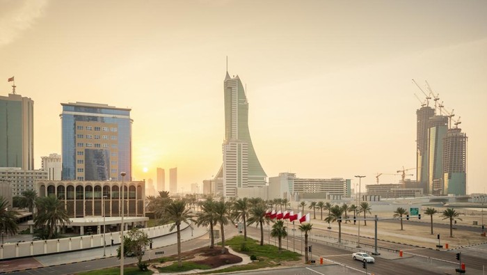 View over Bahrain Financial Harbour, Modern Business Skyscrapers during sunset. Bahrain Financial Harbour, Sea Front, Manama, Bahrain, Middle East.