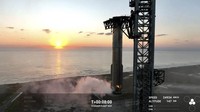 This image provided by SpaceX shows SpaceXs mega Starship rocket upon its return during a test flight, Sunday, Oct. 13, 2024, over Boca Chica, Texas. (SpaceX via AP)