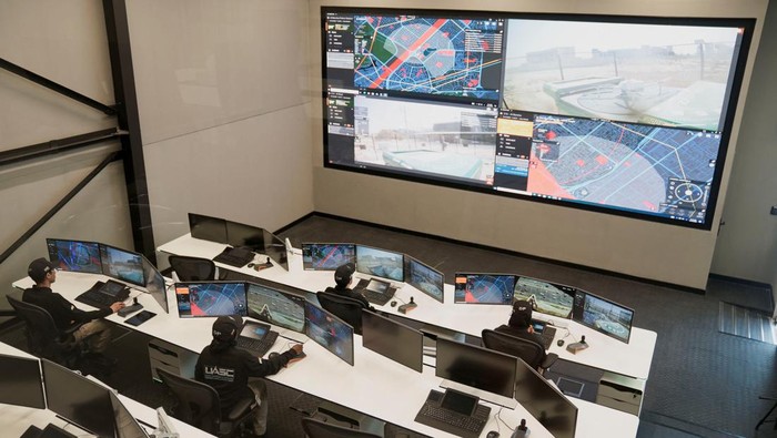 Canggih! Polisi Dubai Kerahkan Drone untuk Respons Cepat SItuasi Darurat Dubai police drone takes off from the Drone Box system in a police station in Dubai, United Arab Emirates, October 10, 2024. REUTERS/Nabila Eltigi