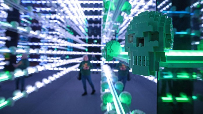 People visit the exhibition ‘Art of the Brick' by U.S. artist Nathan Sawaya, a contemporary artist who takes LEGO into the art world as a medium, in Berlin, Germany, October 16, 2024. REUTERS/Lisi Niesner