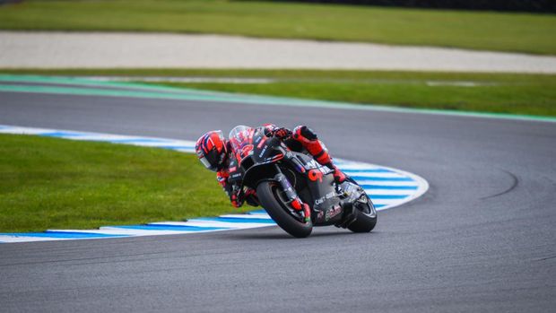 PHILLIP ISLAND, VICTORIA, AUSTRALIA - 2024/10/18: Maverick Vinales of Spain seen in action during the MotoGP practice session on the day one of The Qatar Airways Australian Motorcycle Grand Prix 2024 at Phillip Island. The Qatar Airways Australian Motorcycle Grand Prix 2024 features the world's best and emerging riders. Day one action saw some impressive performance in challenging conditions changing from pouring rain in the morning to bright sunny afternoon. Practice sessions included MotoGP category as well as Moto2 and Moto3. (Photo by Alexander Bogatyrev/SOPA Images/LightRocket via Getty Images)