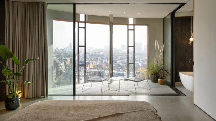Menara air di Belanda yang diubah menjadi apartemen modern/Stijn Poelstra via Dezeen Menara air di Belanda yang diubah menjadi apartemen modern.