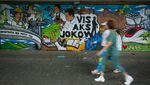 Mural Anak Muda Solo Siap Sambut Kepulangan Jokowi