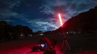 People attend a stargazing and comet-watching gathering at Joya-La Barreta ecological park as comet Tsuchinshan–ATLAS flies overhead in Queretaro, Mexico, Saturday, Oct. 19, 2024. (AP Photo/Ginnette Riquelme)