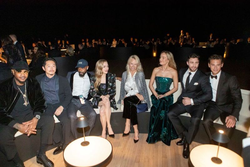 NEW YORK, USA - OCTOBER 17(L-R) Carmelo Anthony, Steven Yeun, LaKeith Stanfield, Amanda Seyfried, Pamela Anderson, Brie Larson and guests are seen at the Giorgio Armani Fashion Show at the Park Avenue Armory , October 17 2024.(Photo by Jonas Gustavsson for The Washington Post via Getty Images)