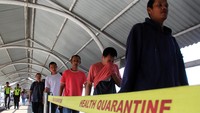Sejumlah pekerja migran yang dipulangkan dari Malaysia tiba di Pelabuhan Dumai, Riau, Selasa (22/10/2024).