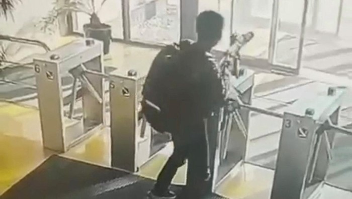 Armed attackers appear on security camera footage approaching a Turkish aviation company building in Ankara, Turkey October 23, 2024 in this still image from social media video obtained by REUTERS  THIS IMAGE HAS BEEN SUPPLIED BY A THIRD PARTY. NO RESALES. NO ARCHIVES. ORIGINAL FOOTAGE IS DISPLAYED ON A MONITOR. BEST QUALITY AVAILABLE.     TPX IMAGES OF THE DAY