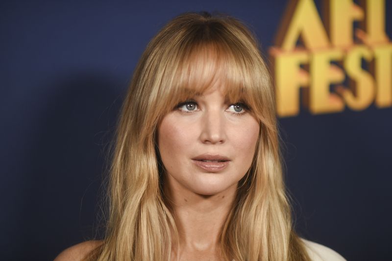 Jennifer Lawrence arrives at the AFI Fest premiere of 