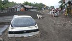 Badai Trami Bikin Mobil-mobil di Filipina Terkubur Endapan Vulkanik