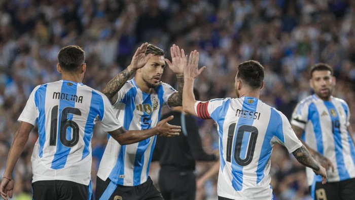 Nahuel Molina, Lionel Messi, and Leandro Paredes of Argentina participate in the FIFA World Cup 2026 Qualifier match between Argentina and Bolivia at Estadio Mas Monumental Antonio Vespucio in Buenos Aires, Argentina, on October 15, 2024. (Photo by Daiana Panza/NurPhoto via Getty Images)