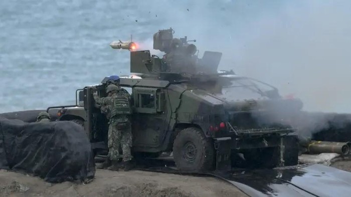 A US-made TOW-2A wire-guided anti-tank missile is launched by Taiwanese soldiers from during a live fire exercise in Pingtung County on August 26, 2024. (AFP)