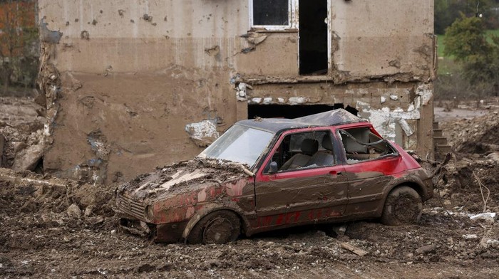 A view inside a house covered with mud following flash floods and landslides in Donja Jablanica, Bosnia, Thursday, Oct. 24, 2024. (AP Photo/Armin Durgut)