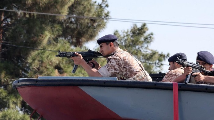 Iranian troops take part in a military parade during a ceremony marking the countrys annual army day in the capital Tehran on April 18, 2023. (Photo by ATTA KENARE / AFP)