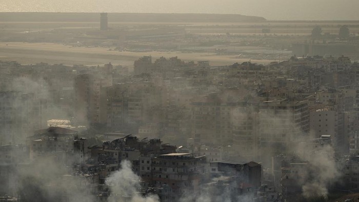 Smoke rises from an Israeli airstrike in Dahiyeh, Beirut, Sunday, Oct. 27, 2024. (AP Photo/Hassan Ammar)