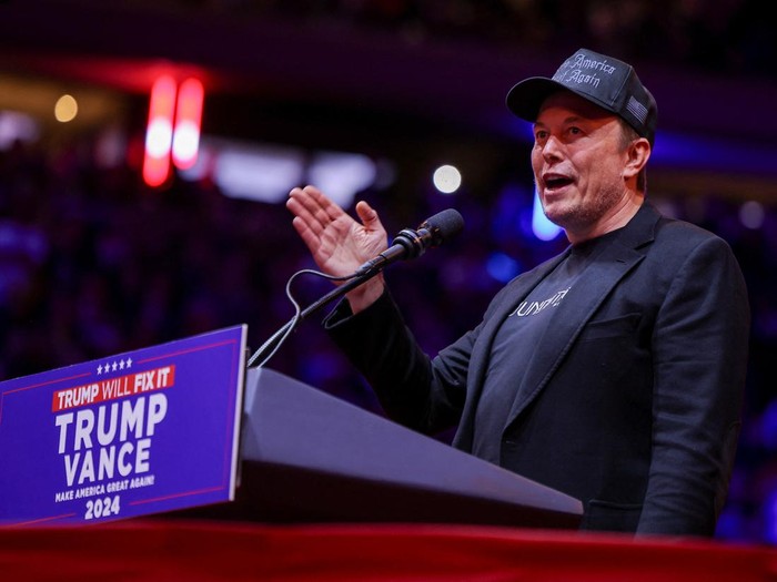 Tesla CEO and X owner Elon Musk speaks during a rally for Republican presidential nominee and former U.S. President Donald Trump at Madison Square Garden, in New York, U.S., October 27, 2024. REUTERS/Carlos Barria