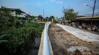 Untuk pelebaran jalan yaitu 2 meter dengan tebal betonisasi mencapai 20 sentimeter (cm).