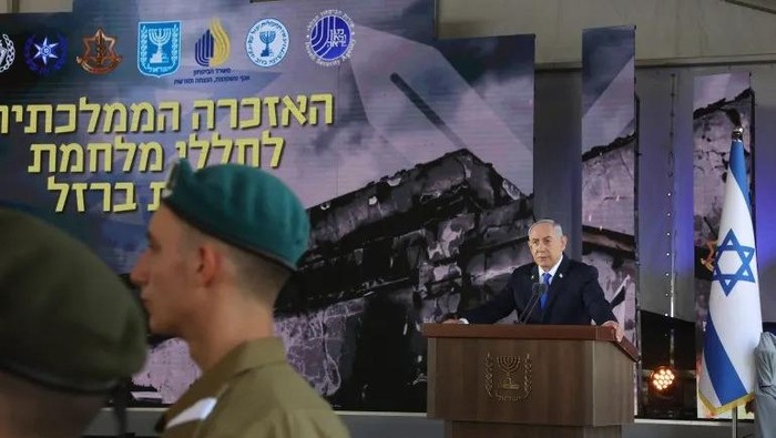 Israel’s Prime Minister Netanyahu speaks during a ceremony marking the Hebrew calendar anniversary of the Hamas attack on October 7 last year. [Gil Cohen-Magen/AFP]