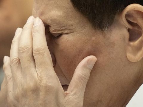Former Philippine President Rodrigo Duterte gestures during a senate inquiry on the so-called war on drugs during his administration at the Philippine Senate Monday, Oct. 28, 2024, in Manila, Philippines. (AP Photo/Aaron Favila)