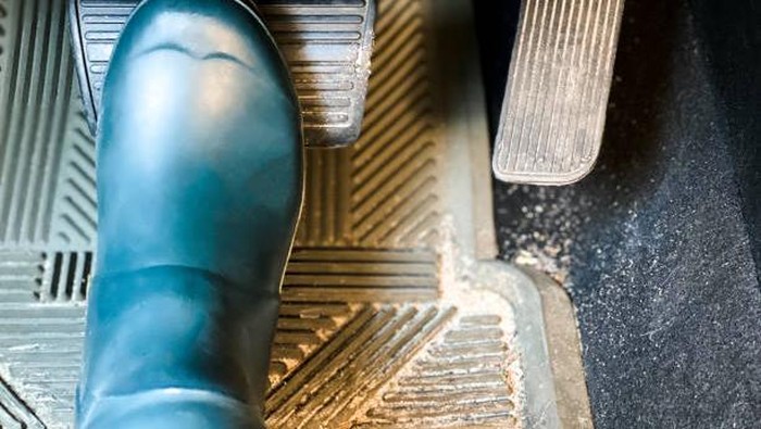 foot on the brake of vehicle