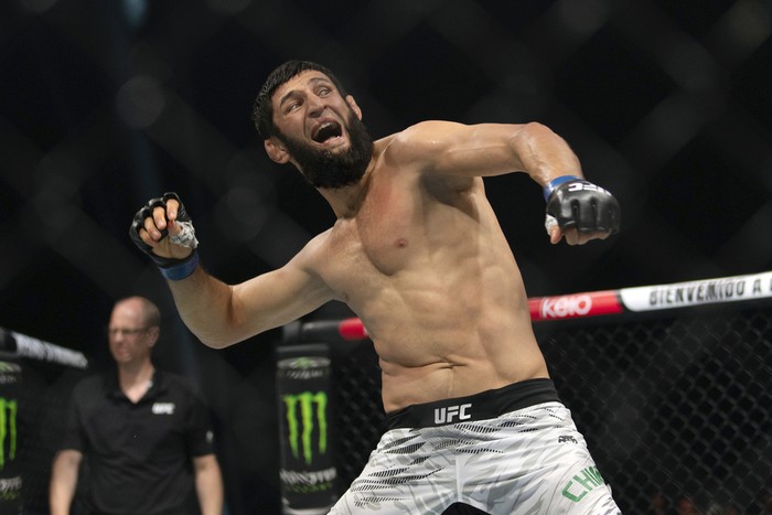 Khamzat Chimaev celebrates his win over Robert Whittaker in a middleweight mixed martial arts bout at UFC Fight Night on Saturday, Oct. 26, 2024, in Abu Dhabi, United Arab Emirates. (AP Photo/Altaf Qadri)