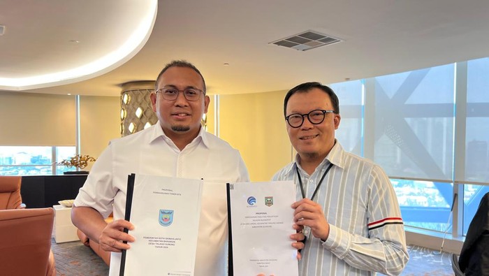 Andre Rosiade bersama Dirut Telkomsel Nugroho