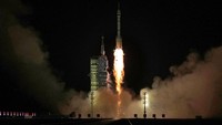 A Long March rocket with a Shenzhou-19 spacecraft atop takes off from the Jiuquan Satellite Launch Center in Jiuquan, northwestern China in the early hours of Wednesday, Oct. 30, 2024. (AP Photo/Ng Han Guan)