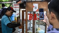 Bank Indonesia akan menerapkan Merchant Discount Rate (MDR) QRIS 0 persen untuk transaksi sampai dengan Rp 500.000 pada merchant Usaha Mikro (UMI), yang berlaku mulai 1 Desember 2024. ANTARA FOTO/Sulthony Hasanuddin. 