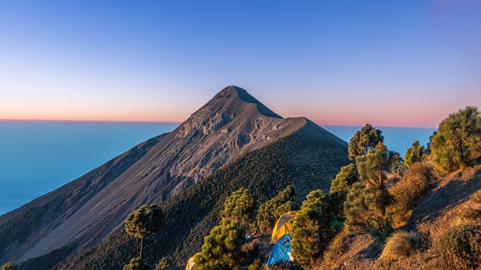 The Volcán de Fuego, located near the town of Antigua, Guatemala. View from the Acatenango volcano.