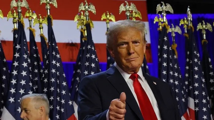 Republican presidential nominee and former U.S. President Donald Trump gestures as he stand on stage at his rally, at the Palm Beach County Convention Center in West Palm Beach, Florida, U.S., November 6, 2024. (Reuters)