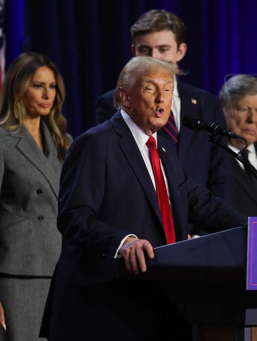 Republican presidential nominee and former U.S. President Donald Trump speaks accompanied by Melania Trump, Barron Trump, Vice Presidential Nominee Senator J.D. Vance, Usha Chilukuri Vance, and  Ivanka Trump, following early results from the 2024 U.S. presidential election in Palm Beach County Convention Center, in West Palm Beach, Florida, U.S., November 6, 2024. REUTERS/Carlos Barria