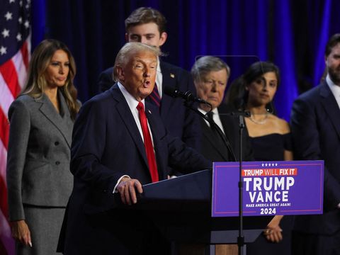 Republican presidential nominee and former U.S. President Donald Trump speaks accompanied by Melania Trump, Barron Trump, Vice Presidential Nominee Senator J.D. Vance, Usha Chilukuri Vance, and  Ivanka Trump, following early results from the 2024 U.S. presidential election in Palm Beach County Convention Center, in West Palm Beach, Florida, U.S., November 6, 2024. REUTERS/Carlos Barria