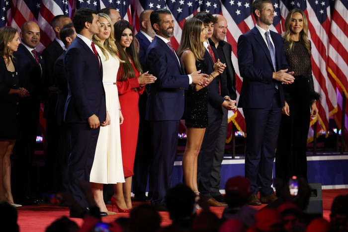 WEST PALM BEACH, FLORIDA - NOVEMBER 06: Members of the Trump family look on as Republican presidential nominee, former U.S. President Donald Trump arrives to speak during an election night event at the Palm Beach Convention Center on November 06, 2024 in West Palm Beach, Florida. Americans cast their ballots today in the presidential race between Republican nominee former President Donald Trump and Vice President Kamala Harris, as well as multiple state elections that will determine the balance of power in Congress.   (Photo by John Moore/Getty Images)