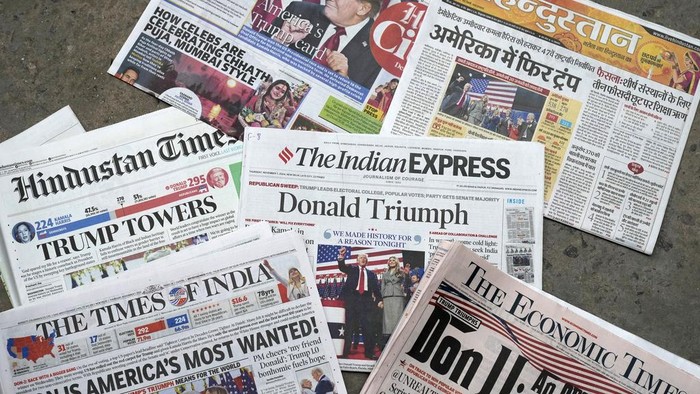 Various Indian newspapers are seen carrying headlines of U.S. president-elect Donald Trump's victory, in New Delhi, India, Thursday, Nov. 7, 2024. (AP Photo/Manish Swarup)