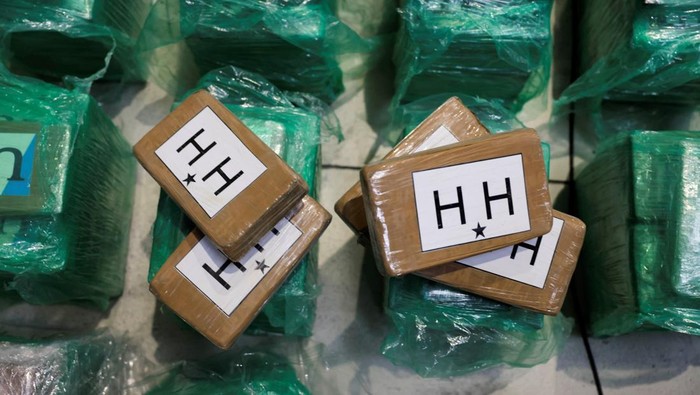 Spanish police display the 13 tons of cocaine, which was seized at the Algeciras port, hidden in banana shipments after it was transported in a container from Ecuador, at the port in Algeciras, Spain, November 6, 2024. REUTERS/Jon Nazca