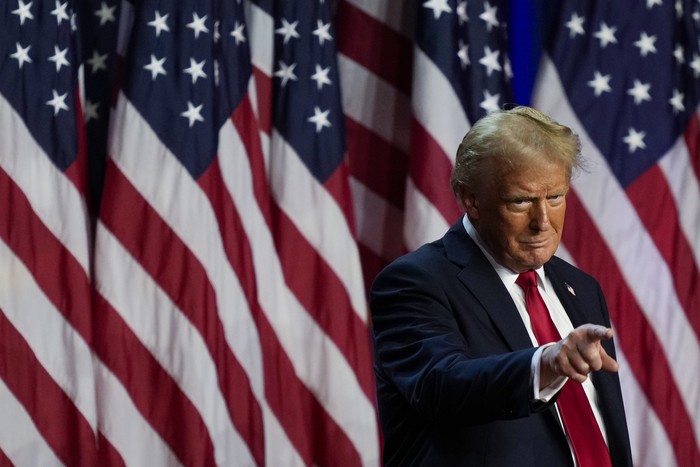 Republican presidential nominee former President Donald Trump arrives at an election night watch party at the Palm Beach Convention Center, Wednesday, Nov. 6, 2024, in West Palm Beach, Fla. (AP Photo/Julia Demaree Nikhinson)