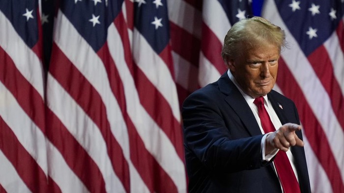 Republican presidential nominee former President Donald Trump arrives at an election night watch party at the Palm Beach Convention Center, Wednesday, Nov. 6, 2024, in West Palm Beach, Fla. (AP Photo/Julia Demaree Nikhinson)