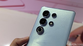 Di bagian belakang terdapat tiga kamera yang terdiri dari kamera utama 50 MP, kamera makro, dan kamera ketiga yang tidak disebutkan. Foto: Virgina Maulita Putri/detikINET