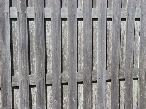 Aged, weathered fencing, interesting textures and background reference.