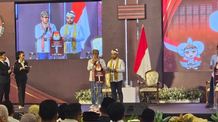 Debat Pilwali Batu Nurochman-Heli