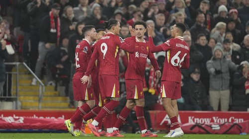 Liverpools Darwin Nunez (9) celebrates with his teammates after scoring the opening goal against Aston Villa during the English Premier League soccer match at the Anfield stadium in Liverpool, Saturday, Nov. 9, 2024. (AP Photo/Jon Super)