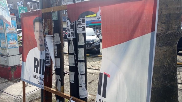 Salah satu baliho Ridha-Rani yang dirusak di Kota Medan (Dok. Istimewa)