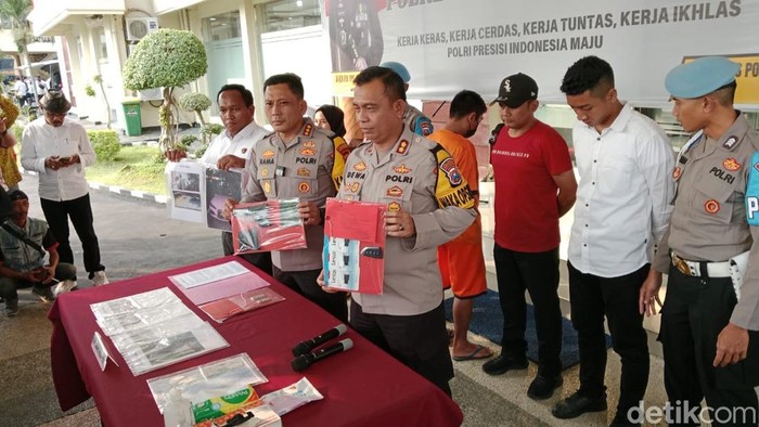 kasus penodongan pistol ke juru parkir Banyuwangi