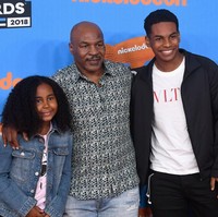 Kiki sempat dipenjara karena kasus penipuan ketika hamil anak pertamanya dengan Mike Tyson. Sebelum dibebaskan, mereka menikah pada Juni 2009. Foto: Getty Images