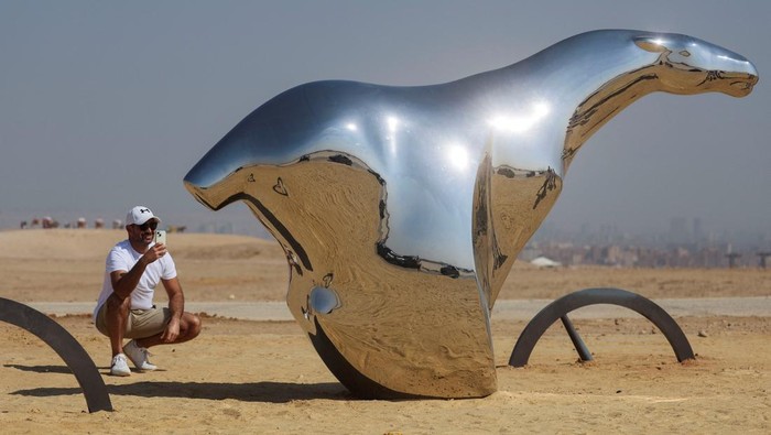 People visit an art installation by visual artist Shila Shivo titled 