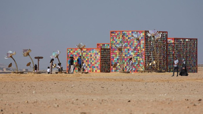 People visit an art installation by visual artist Shila Shivo titled 