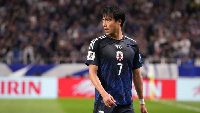 SAITAMA, JAPAN - OCTOBER 15: Kaoru Mitoma of Japan looks on during the FIFA World Cup Asian Third Qualifier Group C match between Japan and Australia at Saitama Stadium on October 15, 2024 in Saitama, Japan.  (Photo by Koji Watanabe/Getty Images)