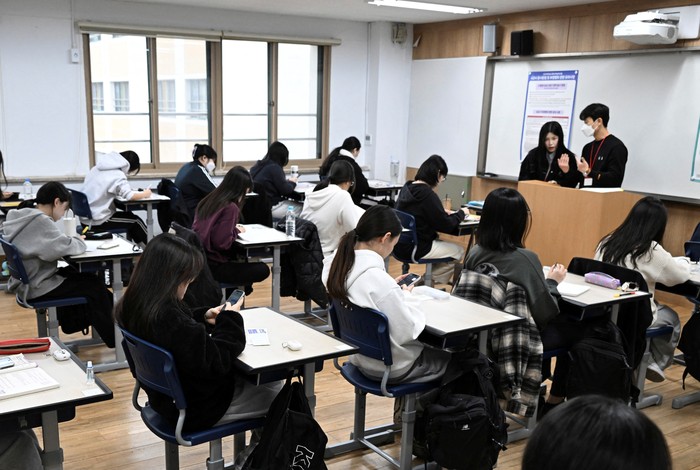 South Korean students wait to take the annual College Scholastic Ability Test at a school in Seoul, South Korea, November 14, 2024. Song Kyung-Seok/Pool via REUTERS