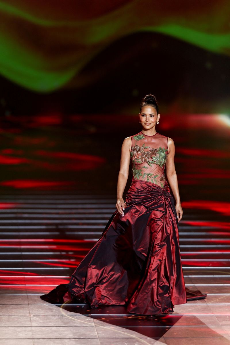 Halle Berry Actor Halle Berry presents a creation from the collection of Lebanese fashion designer Elie Saab during the 'The 1001 Season of ELIE SAAB' fashion show celebrating the fashion designer Saab's 45-year fashion career, as part of Riyadh Season in Riyadh, Saudi Arabia, November 13, 2024. REUTERS/Hamad I Mohammed