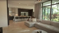 Ruang tamu yang luas ini juga berada di sebelah dapur kering dengan kitchen island putih. Di bagian luar disebut terdapat kolam ikan dan area teras untuk BBQ. Foto: JakePaul/Youtube